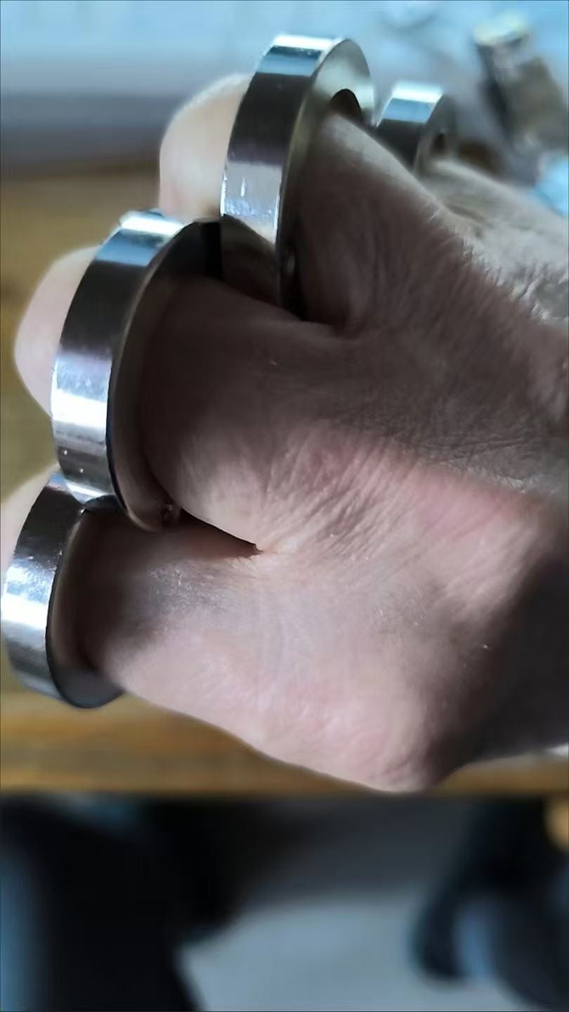 Customer photo review of Transformable Self-Defense Brass Knuckles Ring - Zinc Alloy or Stainless Stee