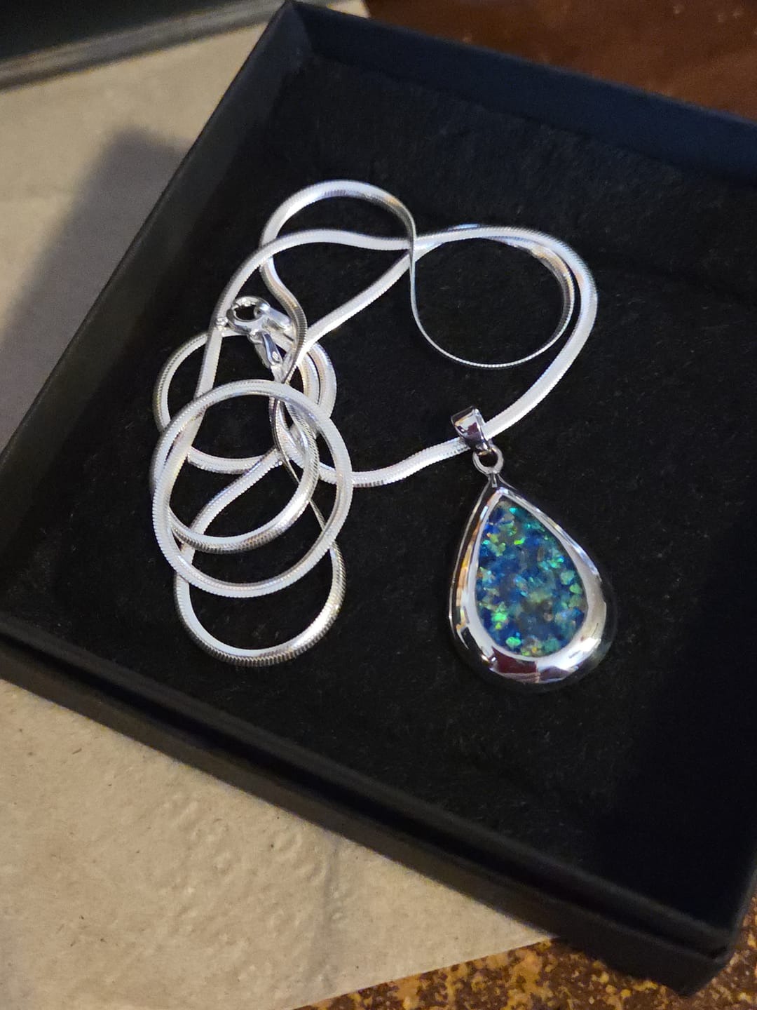 Customer photo review of Pear Drop Opal Cremation Pendant - Engravable