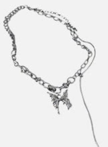 Reviewer's Aelfric Eden Butterfly Pendant Necklace, showing the layered chunky chain and butterfly pendant.