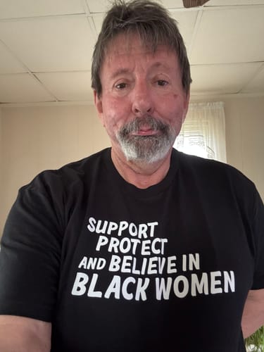 Customer photo review of Black Women Premium Unisex T-Shirt