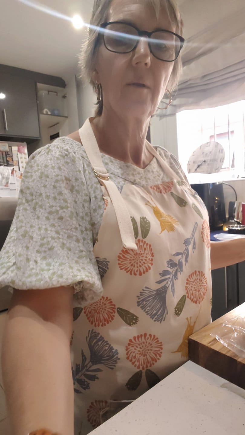 Customer photo review of 100% Cotton Floral Kitchen Apron | Adjustable with Pocket