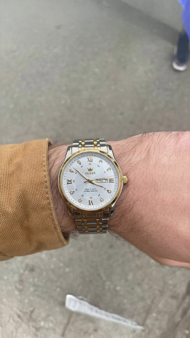 Customer photo review of OLEVS - Magnate