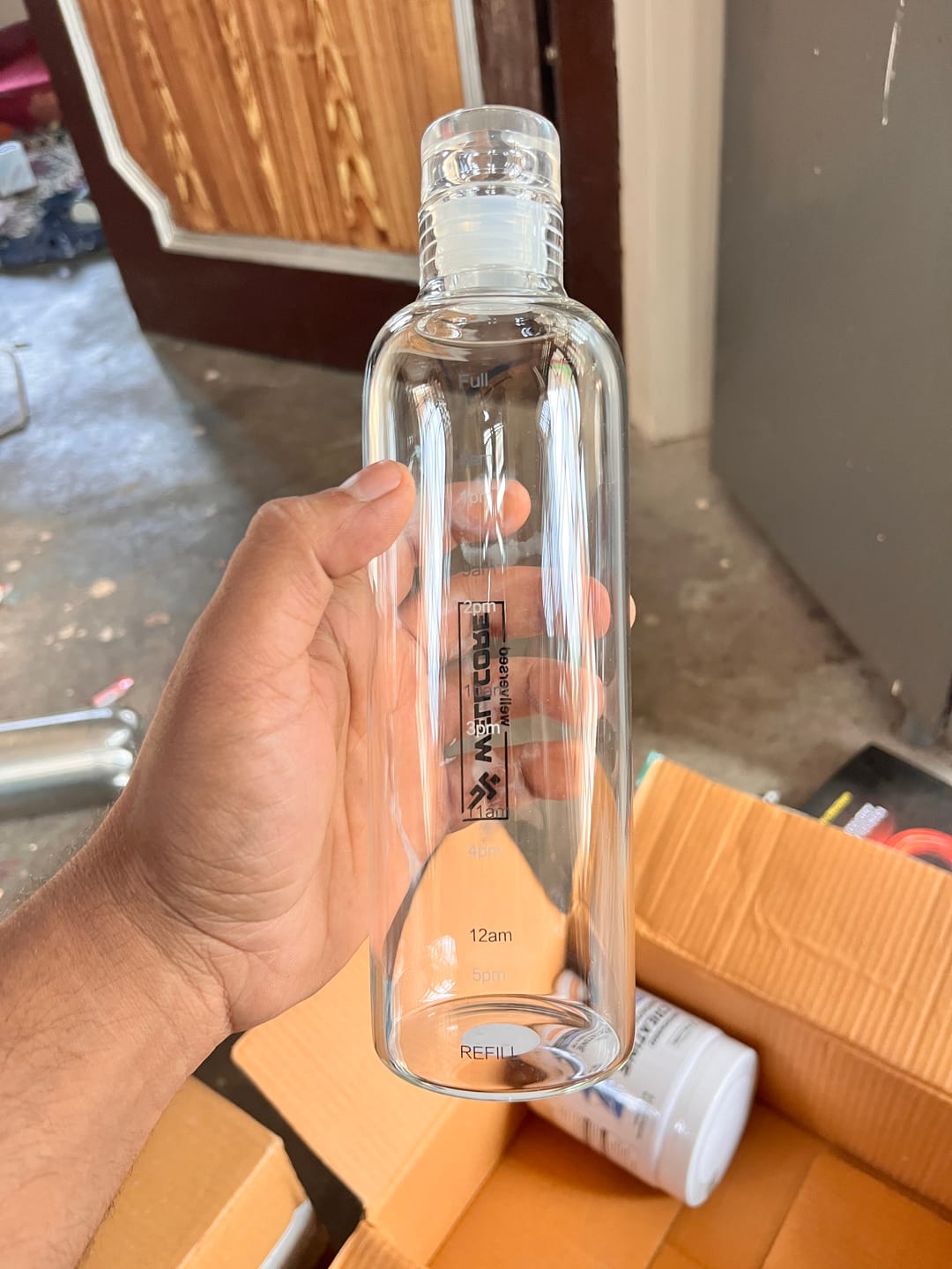 Customer photo review of Wellcore - Micronised Creatine Monohydrate (83 Servings, Tropical Tango) + Premium Glass Bottle