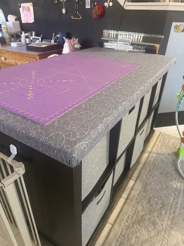 Reviewer's custom ironing station built with Felted Wool Pressing Mats, covered by fabric and topped with a purple cutting mat.