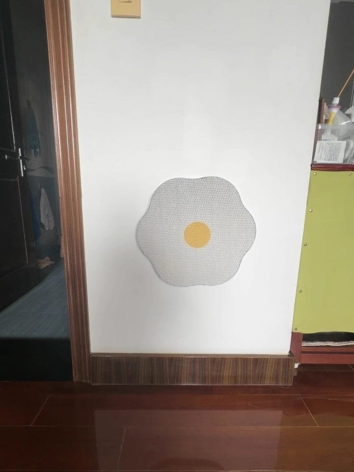 Customer photo review of Flower-Shaped, Connectable, Non-Shedding Plant Pulp Cat Scratching Pad