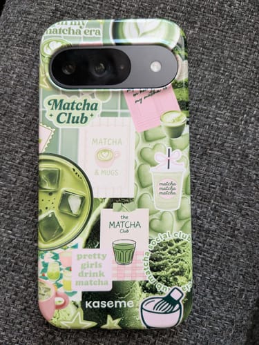 Reviewer's Matcha Rituals phone case on a phone, showing its detailed, green and pink matcha-themed collage design.