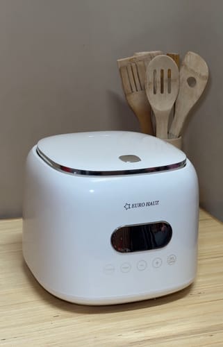 Customer's white Eurohauz Healthy Rice Cooker on a wooden kitchen counter.