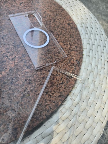Customer's Anti Yellow Magsafe Clear Case for the Galaxy Z Fold 6, shown in two pieces on a stone table.