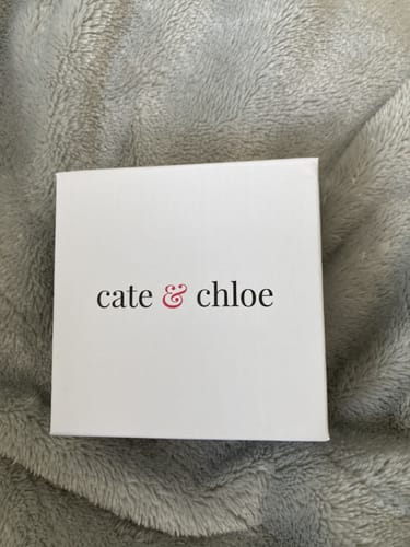Packaging for the Pria Bead Station Chain Necklace, showing the white Cate & Chloe gift box.