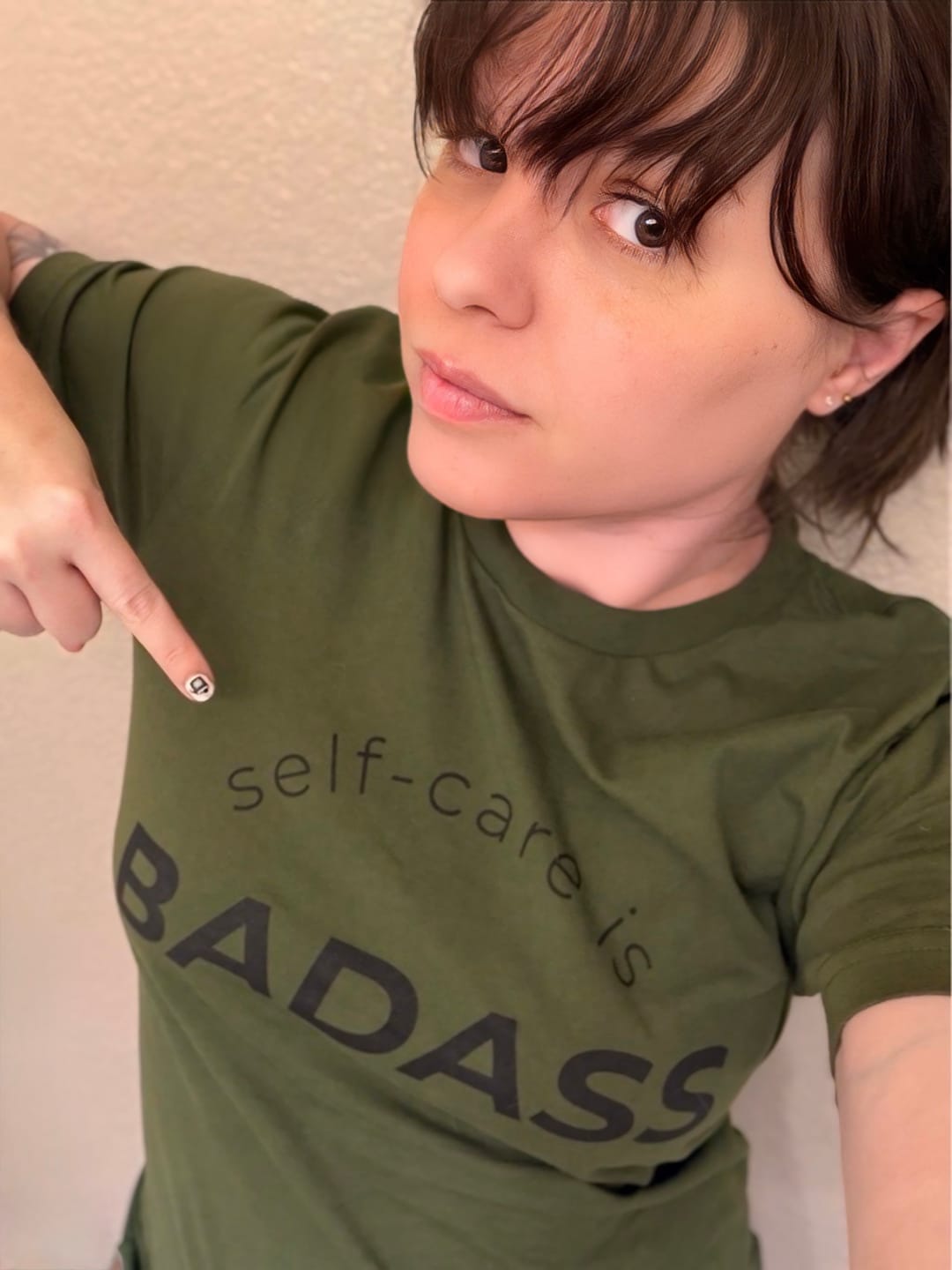 Customer photo review of Self-Care Is Badass T-Shirt