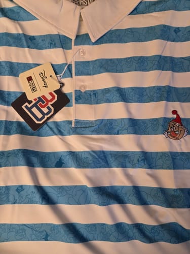 Close-up of the customer's blue and white striped 'The Smee' All-Day Polo with an embroidered Mr. Smee on the chest.