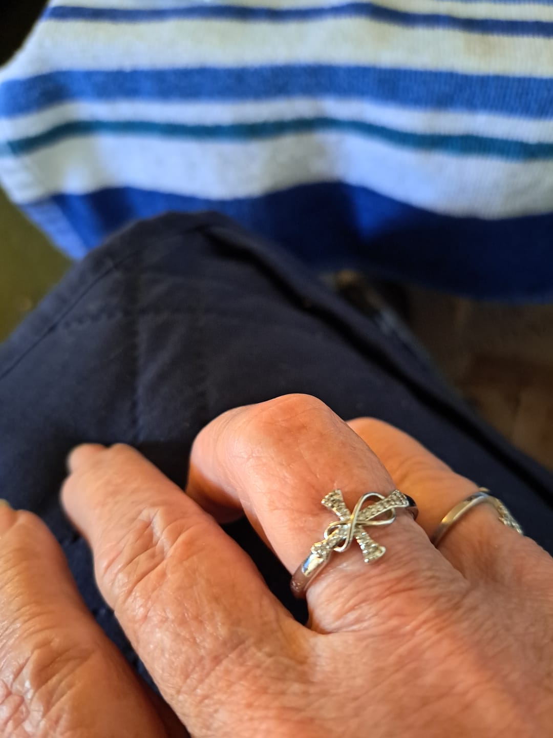Customer photo review of Christianartworkshop Golden/Silver Mobius Cross Ring: Carry His Grace in Daily Wear