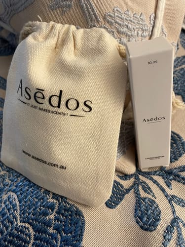 Reviewer's packaging for the Floral Bouquet Perfume Oil, including the white box and a small pouch.