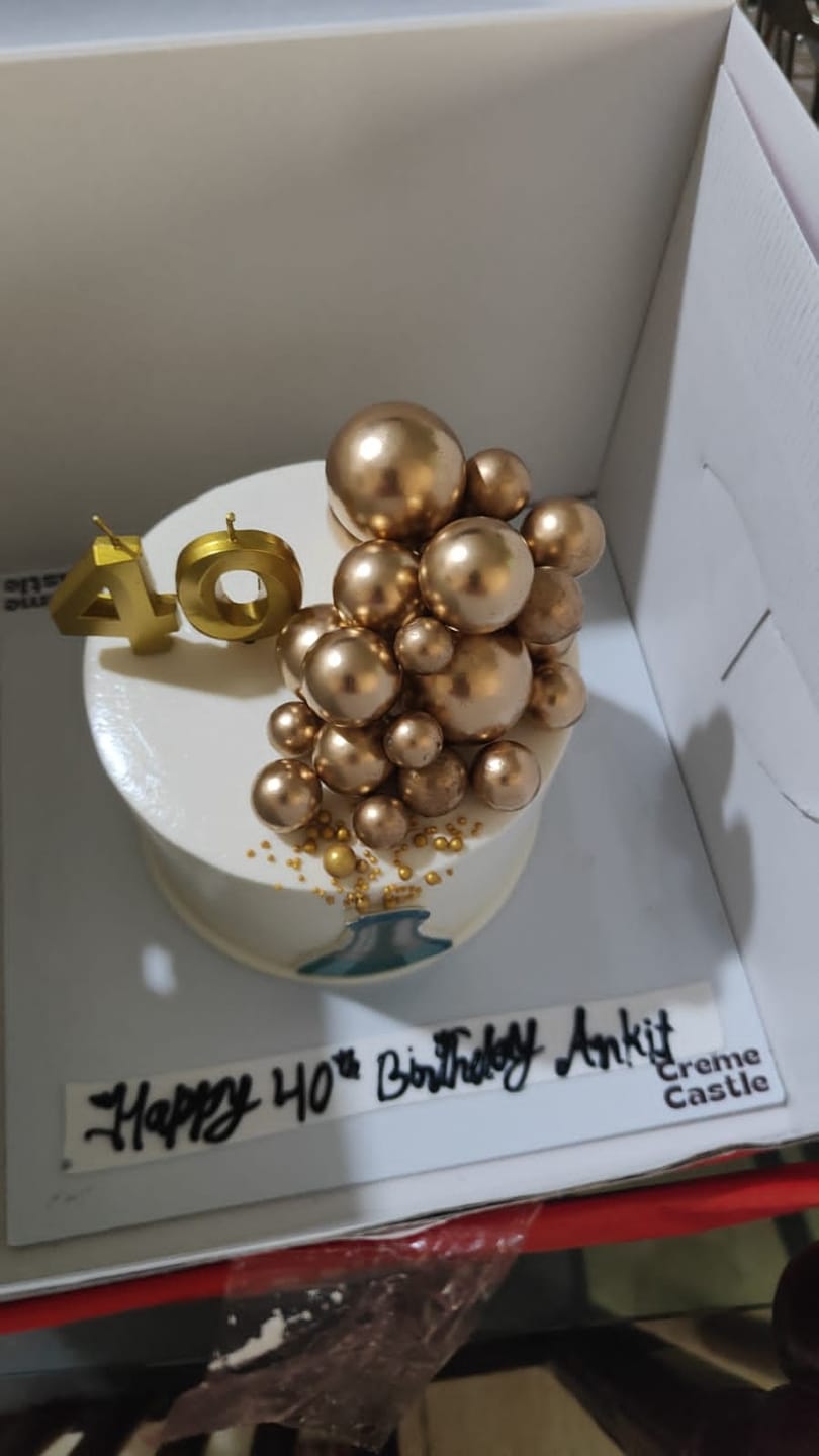 Customer photo review of Champagne Celebration Theme Cake