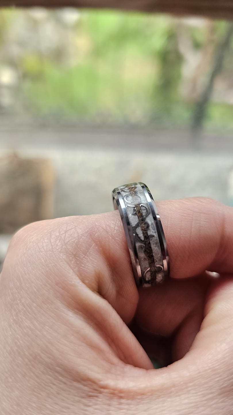 Customer photo review of Beveled tungsten ring with Moonstone mixed with white opal, meteorite circle shavings, velociraptor line 8 mm for Sheila