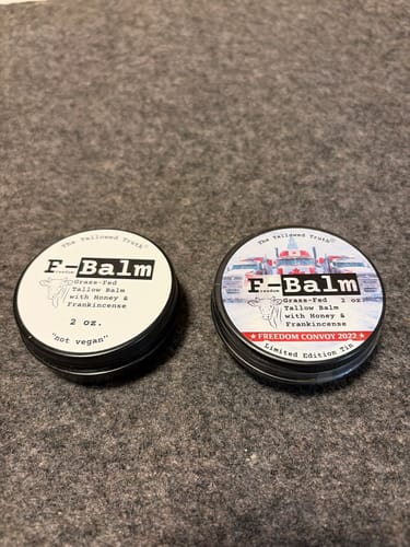 Customer's two tins of F-Balm, showing the standard label and the limited Freedom Convoy special edition label side-by-side.