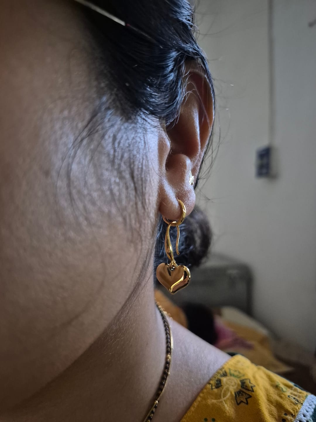 Customer photo review of Dangling Heart Earrings