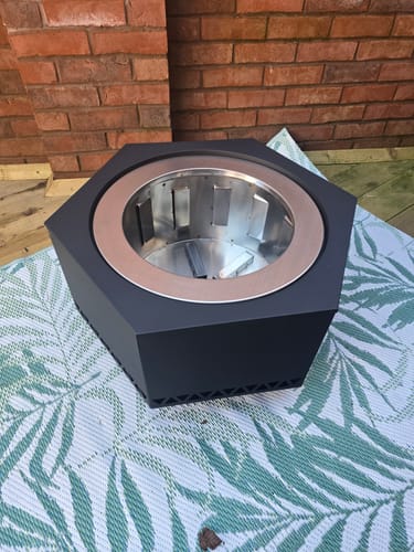 Customer photo review of SUNJOY 66CM Hexagon Smokeless Fire Pit with Poker