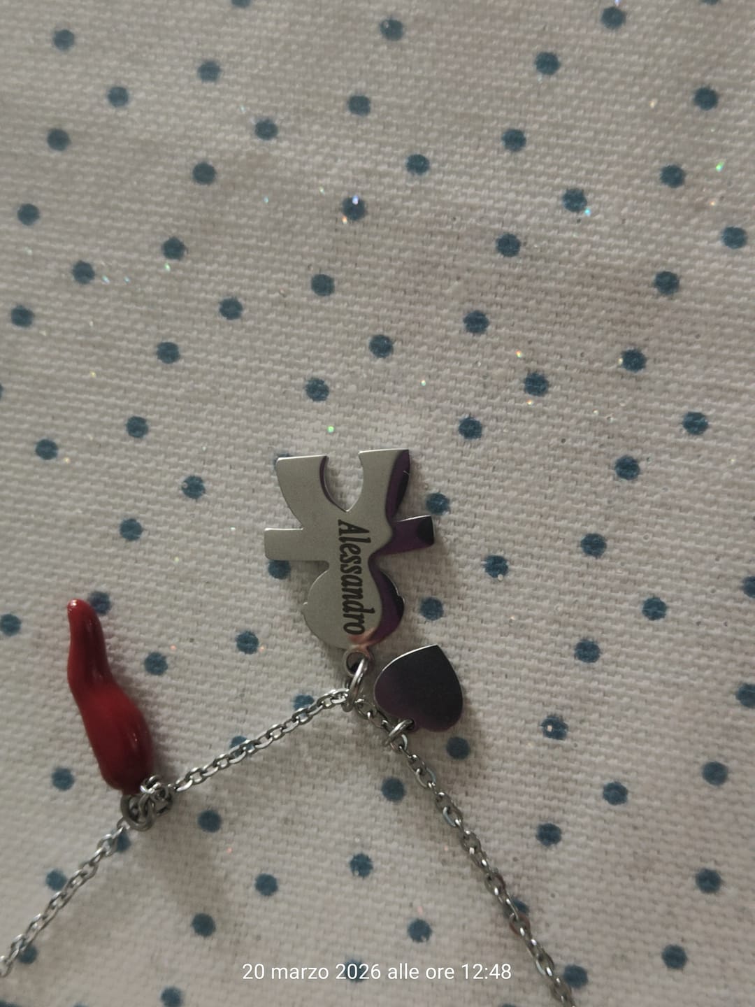 Customer photo review of Ciondolo bimbo con incisione del nome