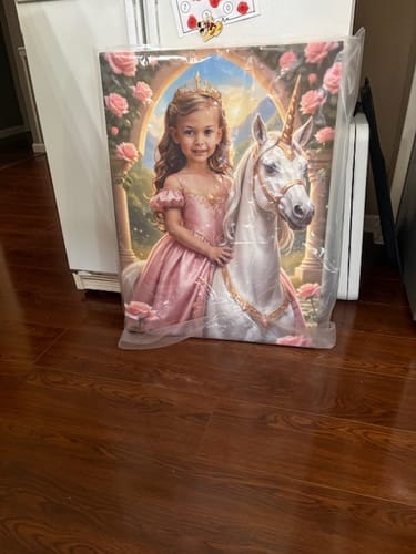 Customer's beautiful 'Baby Unicorn Princess' portrait of a young girl with a unicorn, still in its plastic wrap.