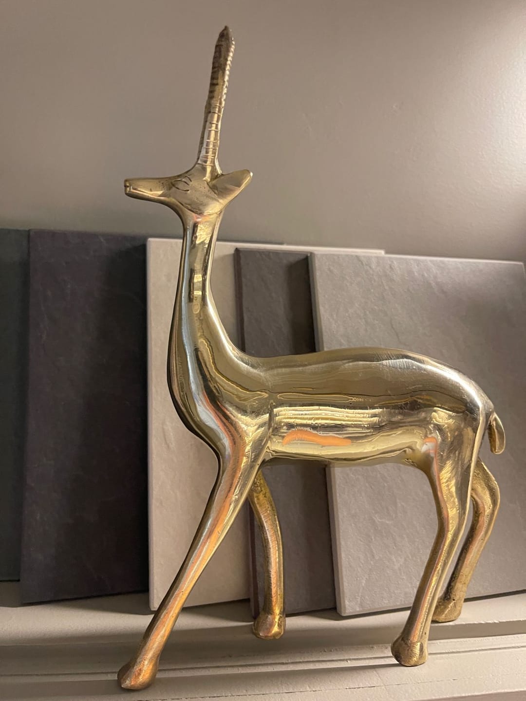 Customer photo review of Handcrafted Brass Deer Idol Vastu Remedy for Stability, Stamina and Energy Balance for WNW Zone, Home and Office Placement | 12 x 22 cm | 820 gm
