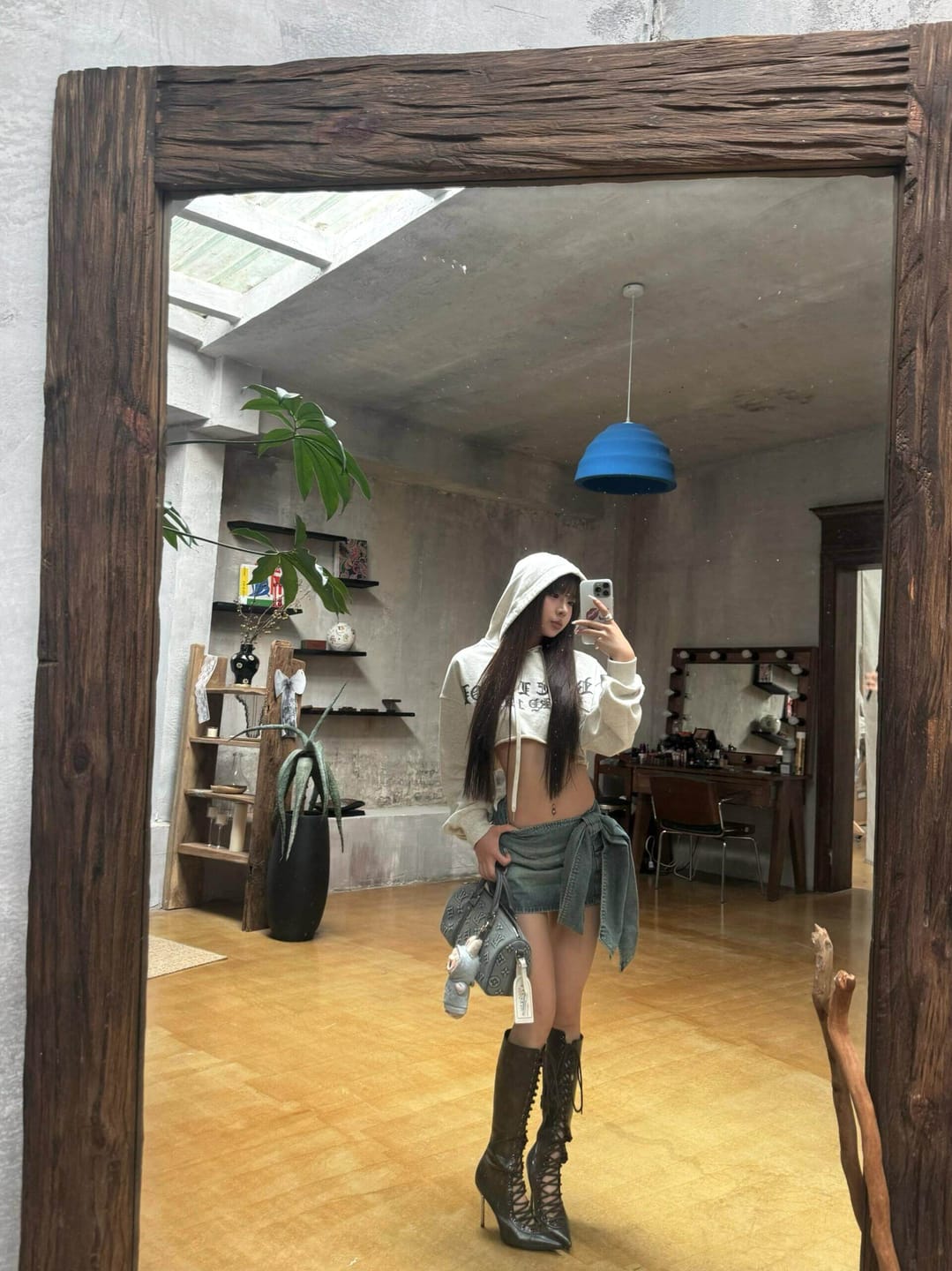 Customer photo review of Rase le sol Asymmetric Tie-Front Denim Mini Skirt
