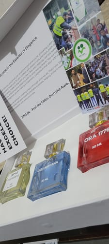 Customer's OUD Supreme BUNDLE showing three colorful perfume bottles sitting inside the open white box.