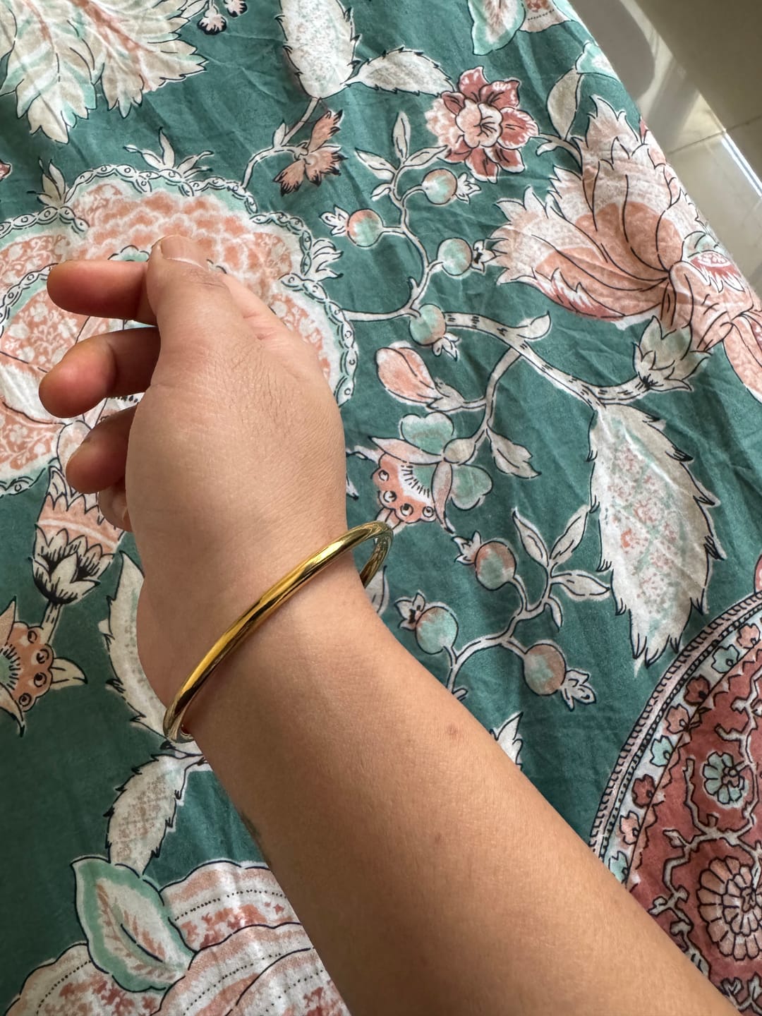 Customer photo review of Classic Gold Bangle Bracelet