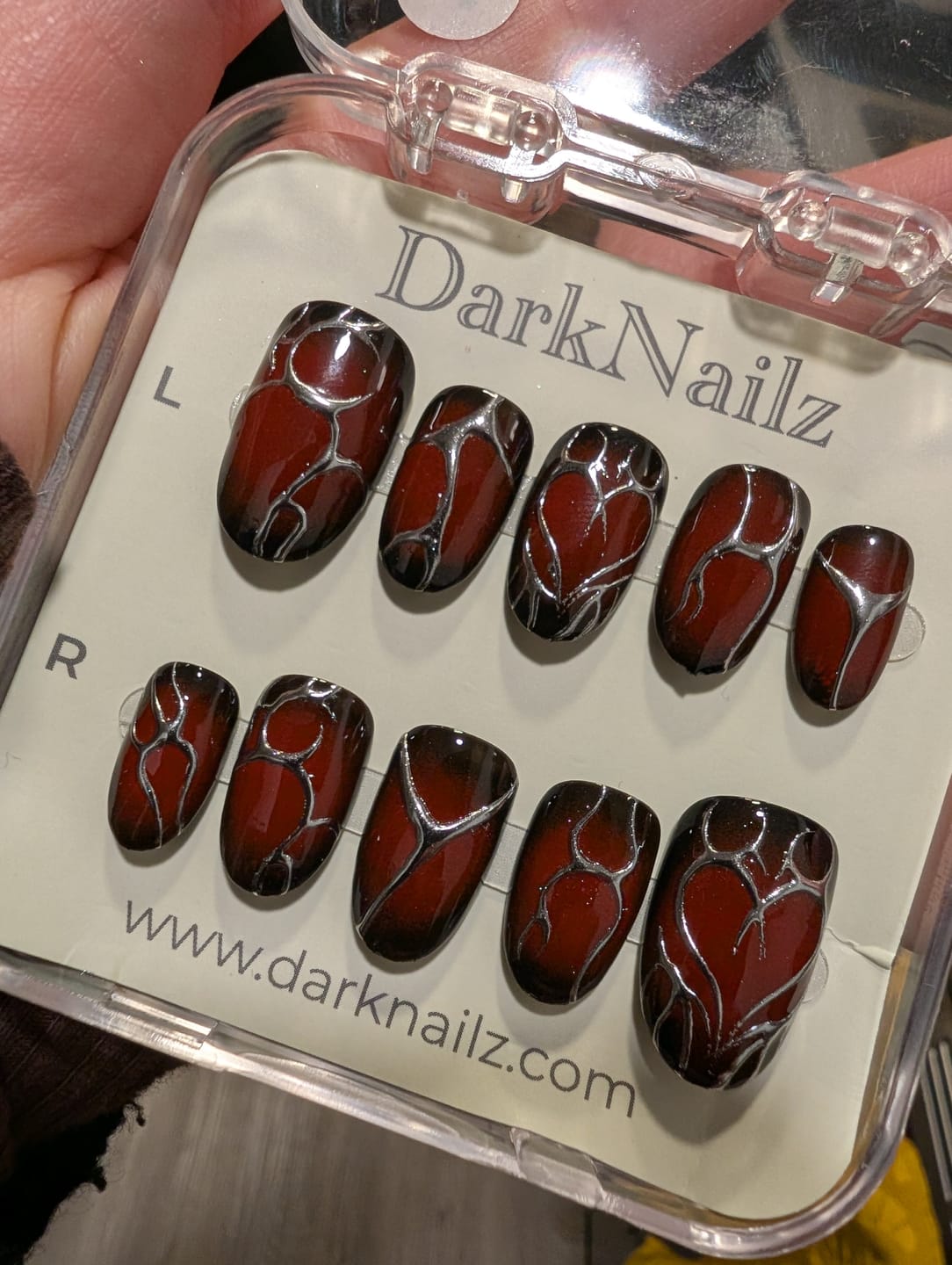 Customer photo review of Bloody Romance Heart Press-On Nails, Burgundy Chrome Fake Nails with Gothic Silver Veins