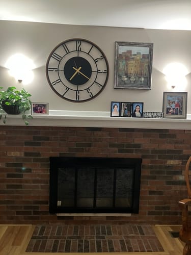 Customer photo review of METAL WALL CLOCK with Wooden Corners