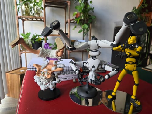 Customer's Solar Flare and White Frost Stickybones figures in dynamic poses, with one supported by the White Hot Fly-Rig.