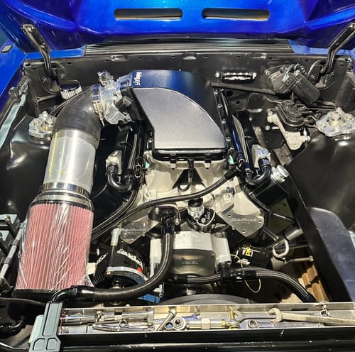 Customer's photo of a performance engine with multiple black Fragola -6 AN Straight Hose Ends installed.