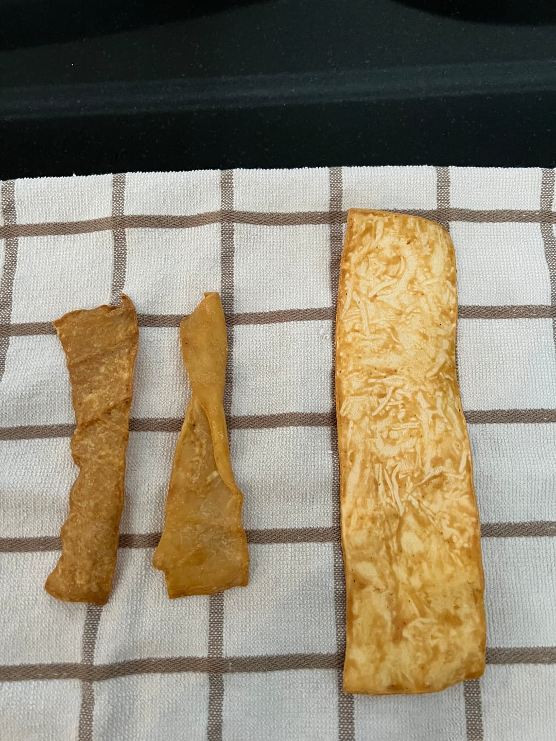 Customer photo review of Redbarn Bully Slices Vanilla Flavor Beef Hide Dog Treats 255g