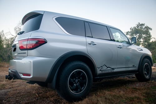 Customer's clean, silver 4WD shown from the rear three-quarter angle after using the care package.