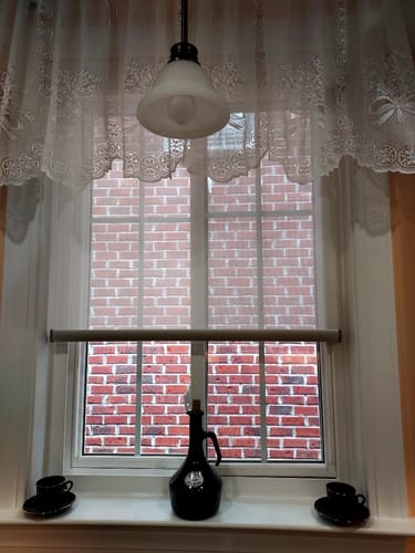 Customer photo review of SmartWings Motorized Light Filtering Roller Shades 50% Blackout PVC Free Sunscreen
