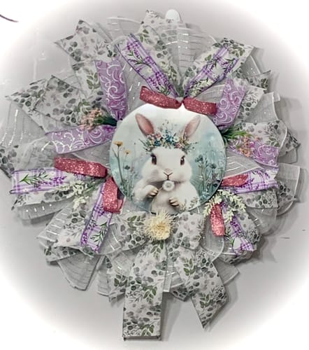 Customer's decorative bunny wreath made using the white fine weave metallic mesh with silver foil.