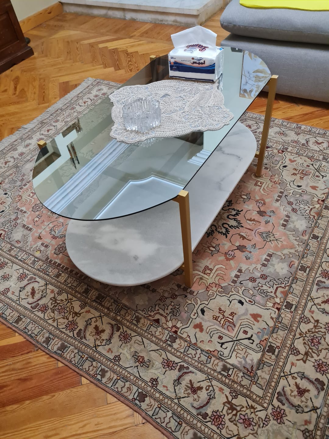 Customer photo review of An oval table with two tops, one of which is a glass top