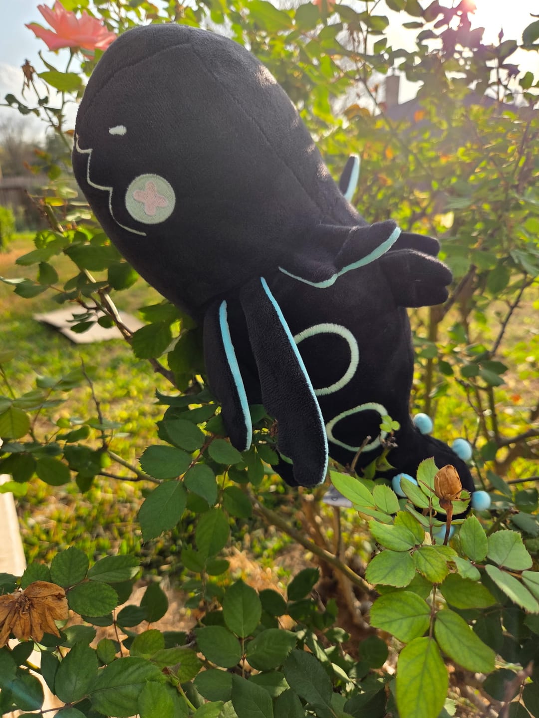Customer photo review of Rain World - Glowing Cyan Lizard Plush