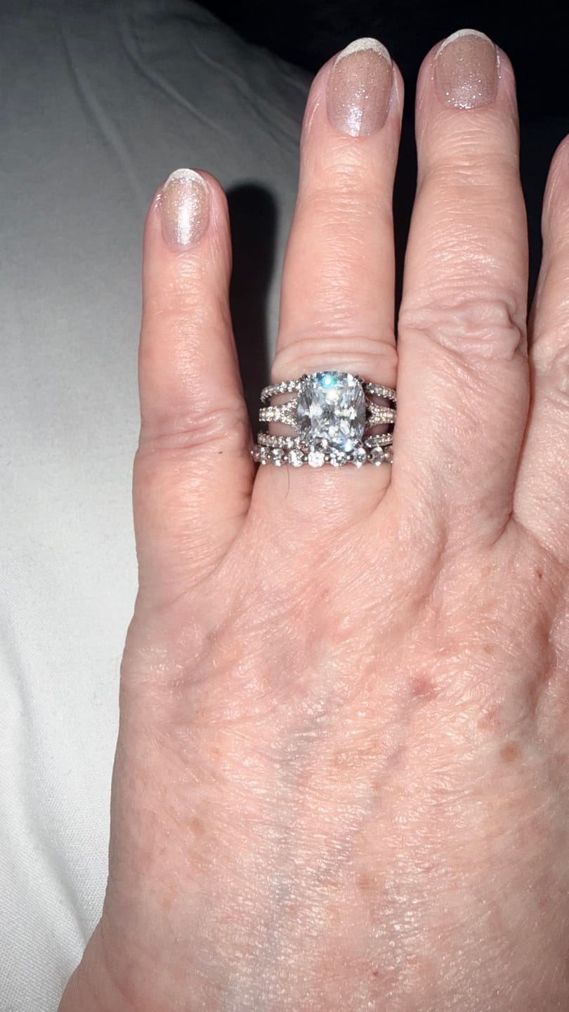 Customer photo review of S925 7.0Ct/4.0Ct Split Shank Cushion Cut Engagement Ring 18K White Gold Plated Travel Rings with Pavé Accents