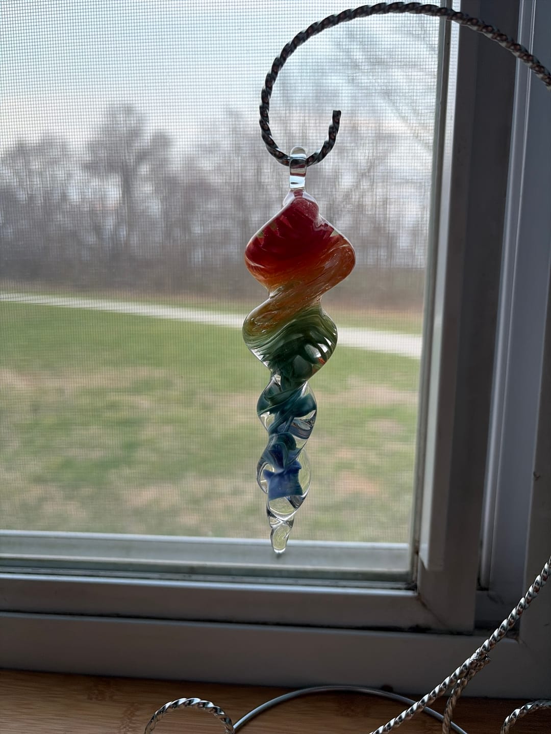 Customer photo review of Rainbow Bridge Spinner with Cremation Ash