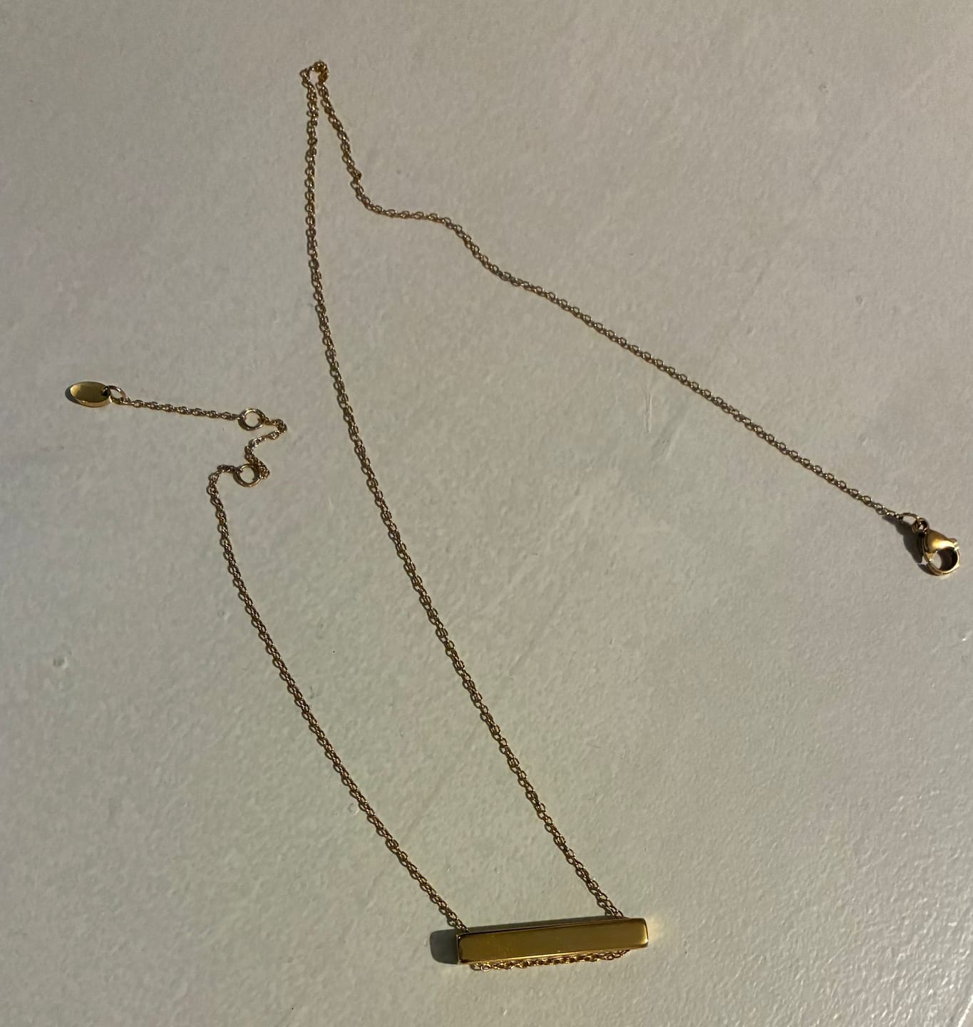Customer photo review of 3cm Letter Bar Necklace in Gold Horizontal
