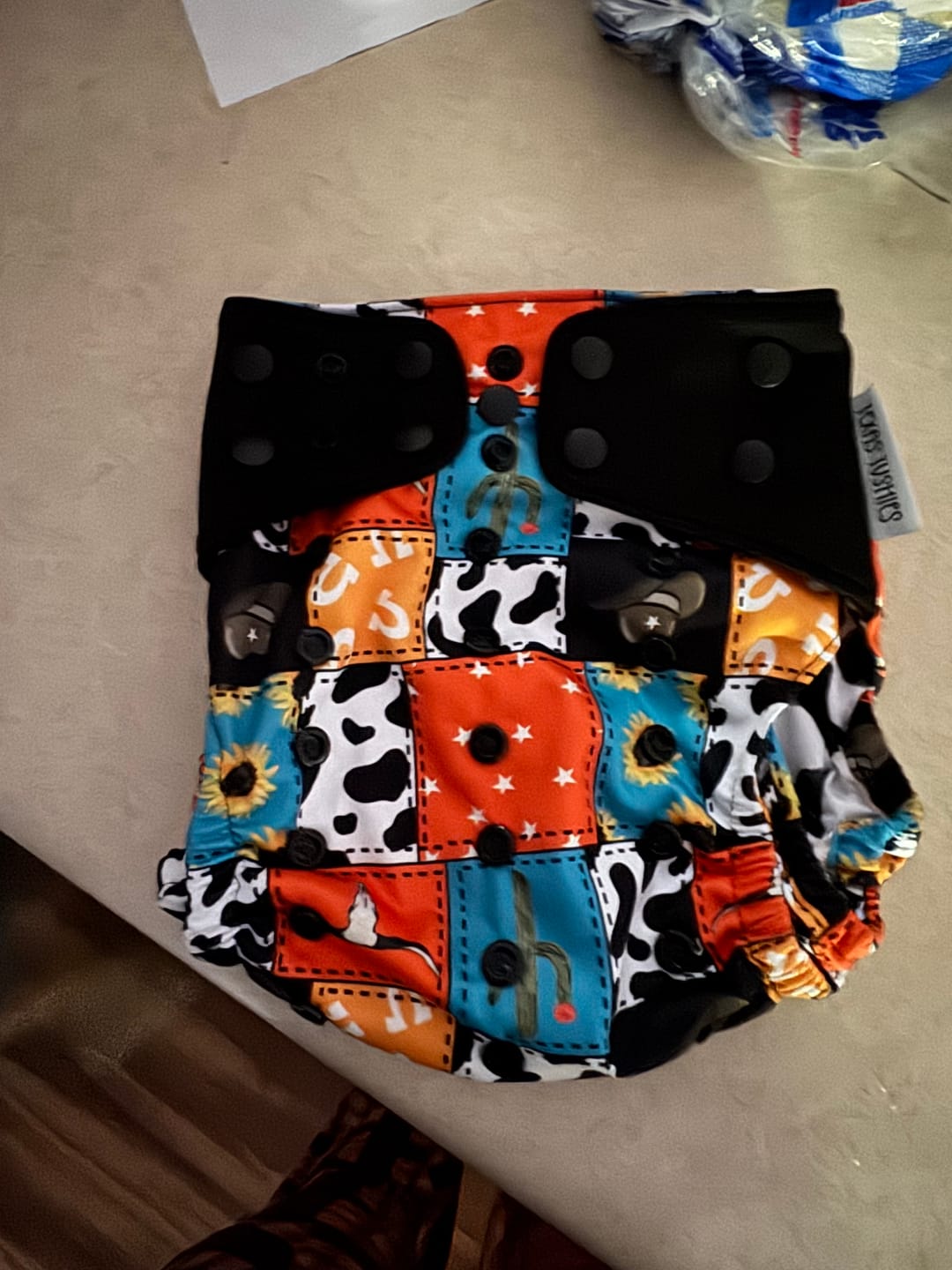 Customer photo review of The Ultimate - One Size Pocket Reusable Cloth Diaper - Stretchy Tabs