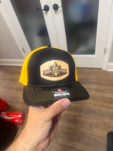 Customer photo review of Custom Leather Patch Trucker Hat - Richardson 112