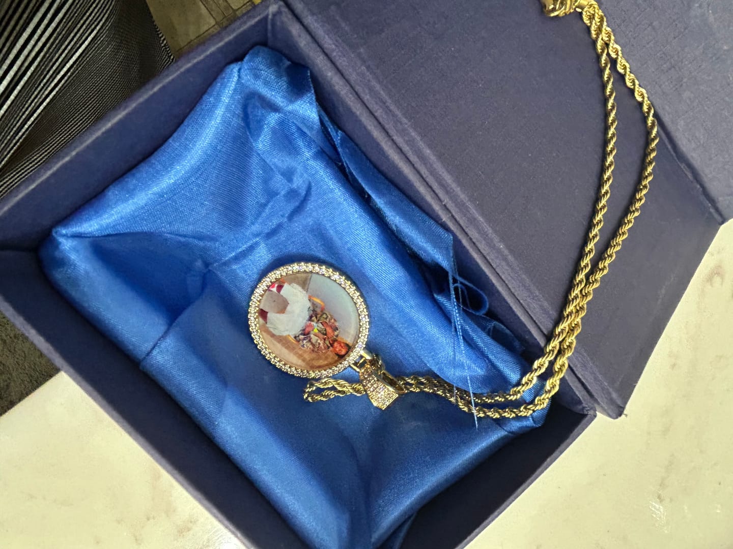 Customer photo review of Diamond Studded Angel Wing Photo Necklace