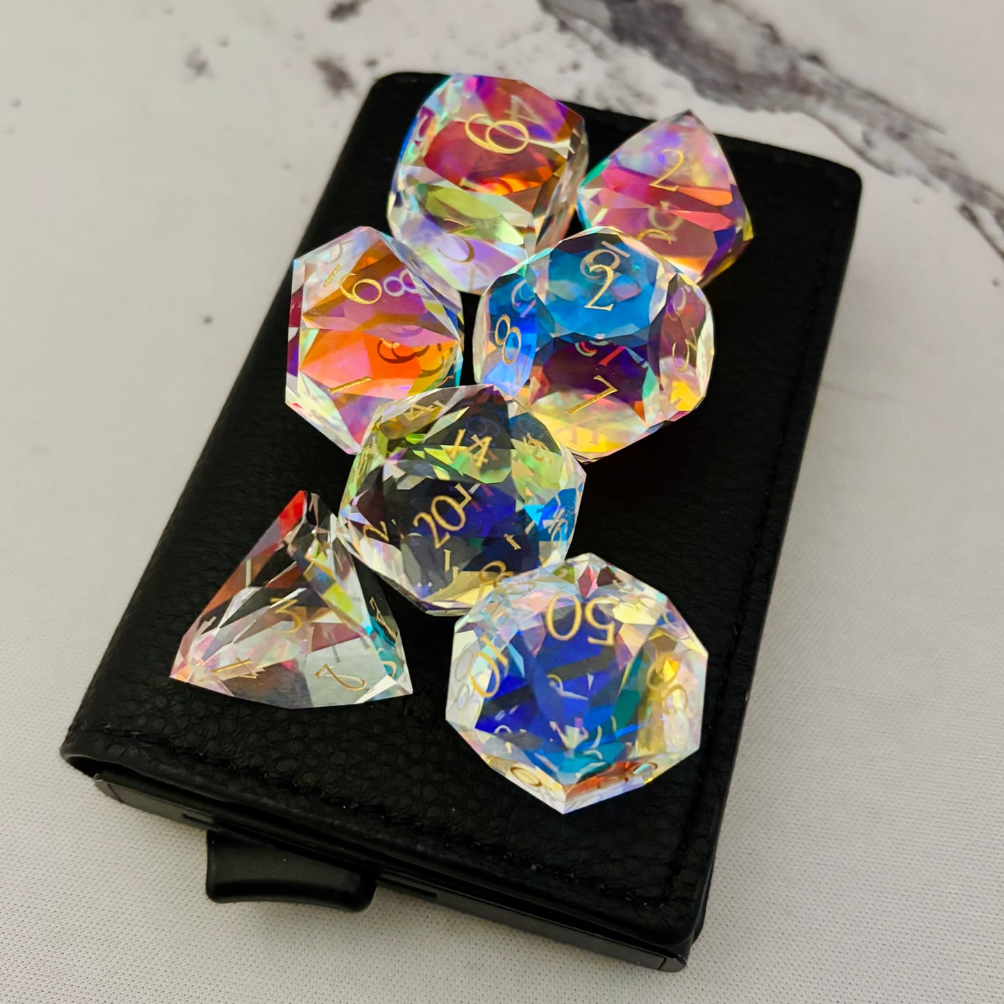 Customer photo review of URWizards D&D Multi-faceted Prism Glass Engraved Dice Set