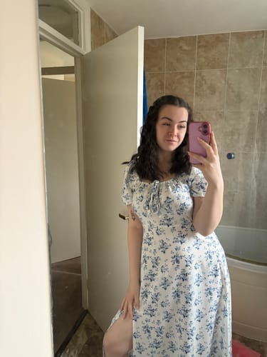 Reviewer taking a mirror selfie, showing the full and natural look of the Lazy Girl Pre-Glued Under Lashes.
