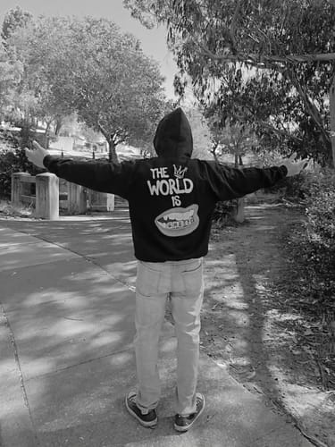 Customer photo review of The World Is Ghetto Hoodie