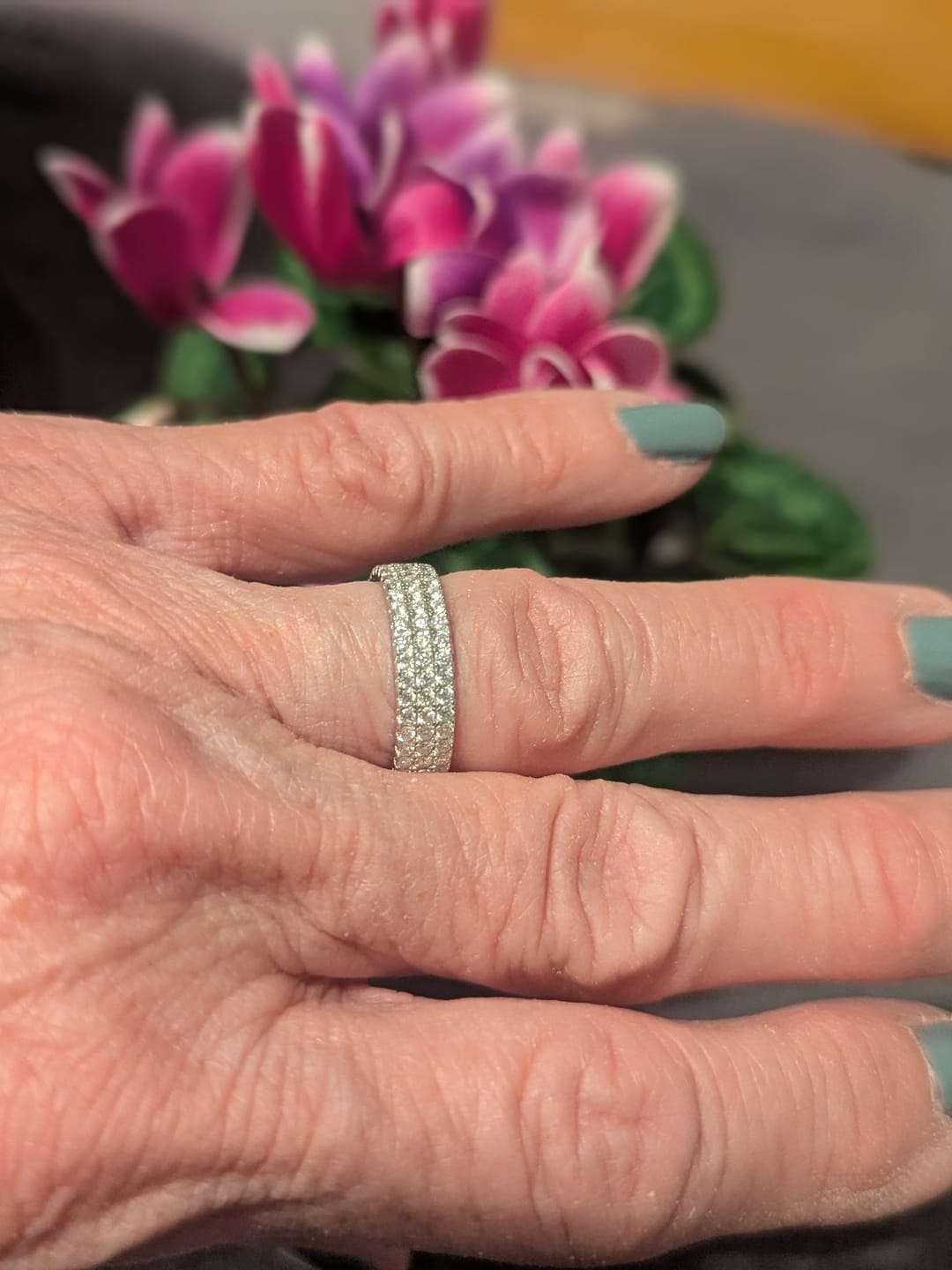 Customer photo review of 5mm Triple Row Moissanite Eternity Ring