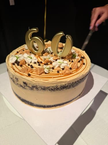 Customer photo review of chocolate caramel cake