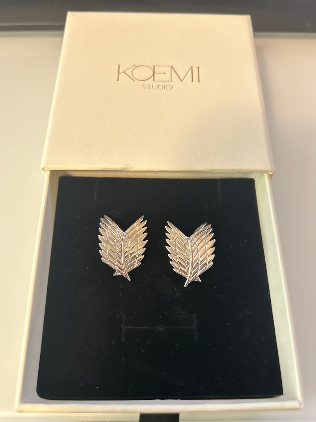 Customer photo review of AOT Freedom Earrings